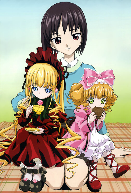 Three girls having a tea party