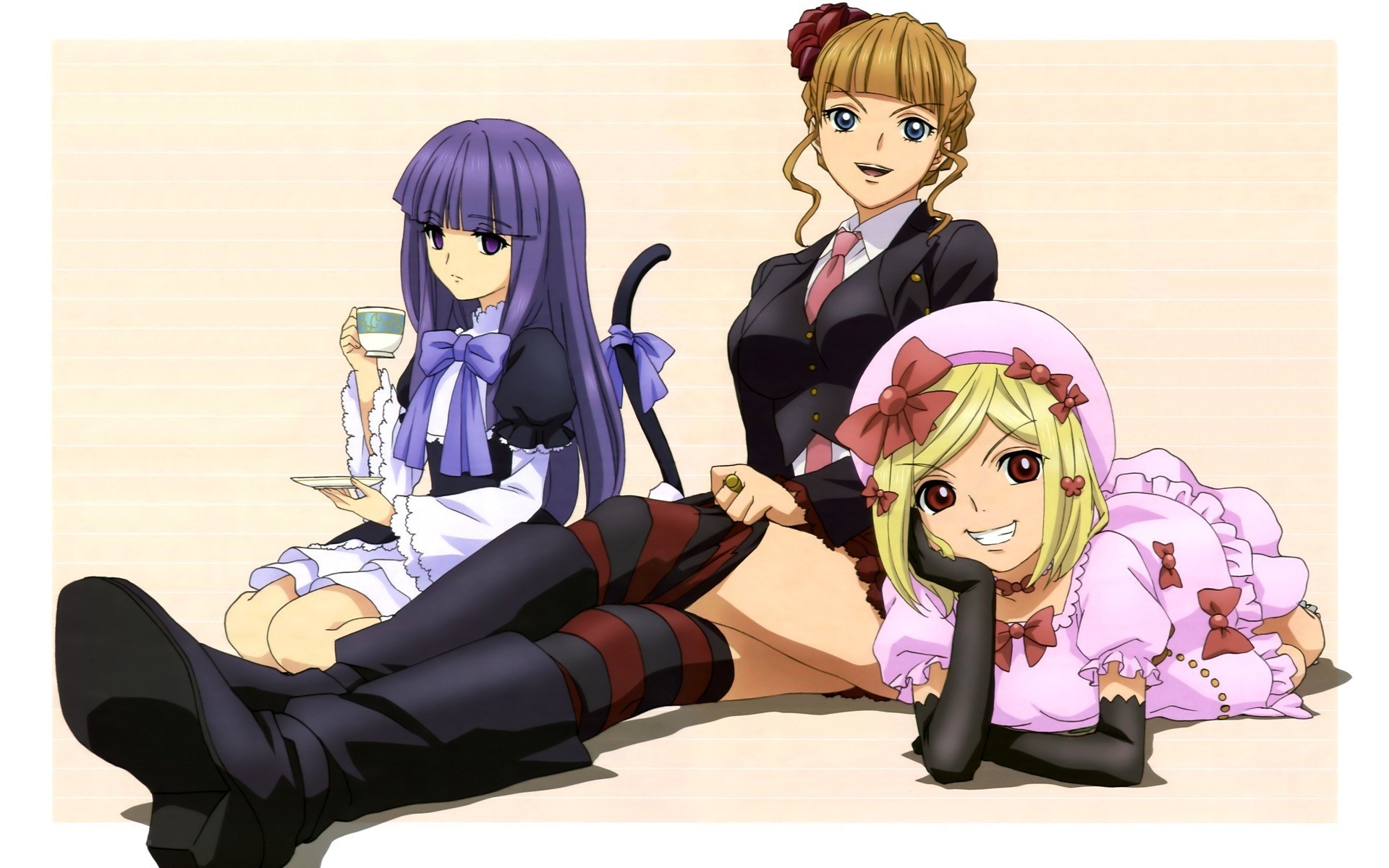 Three girls having tea