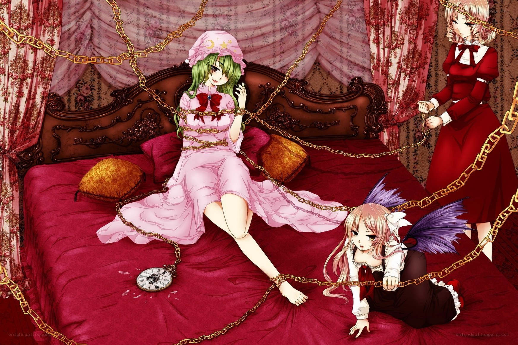 Three girls in a bed with chains