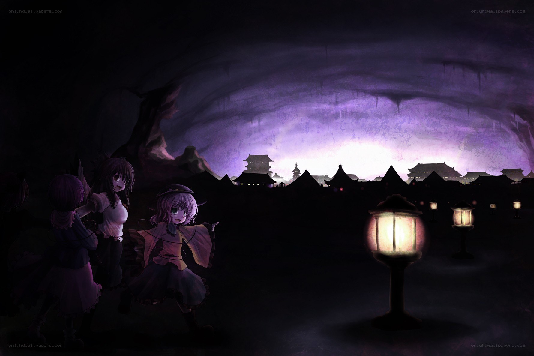 Three girls in a dark cave