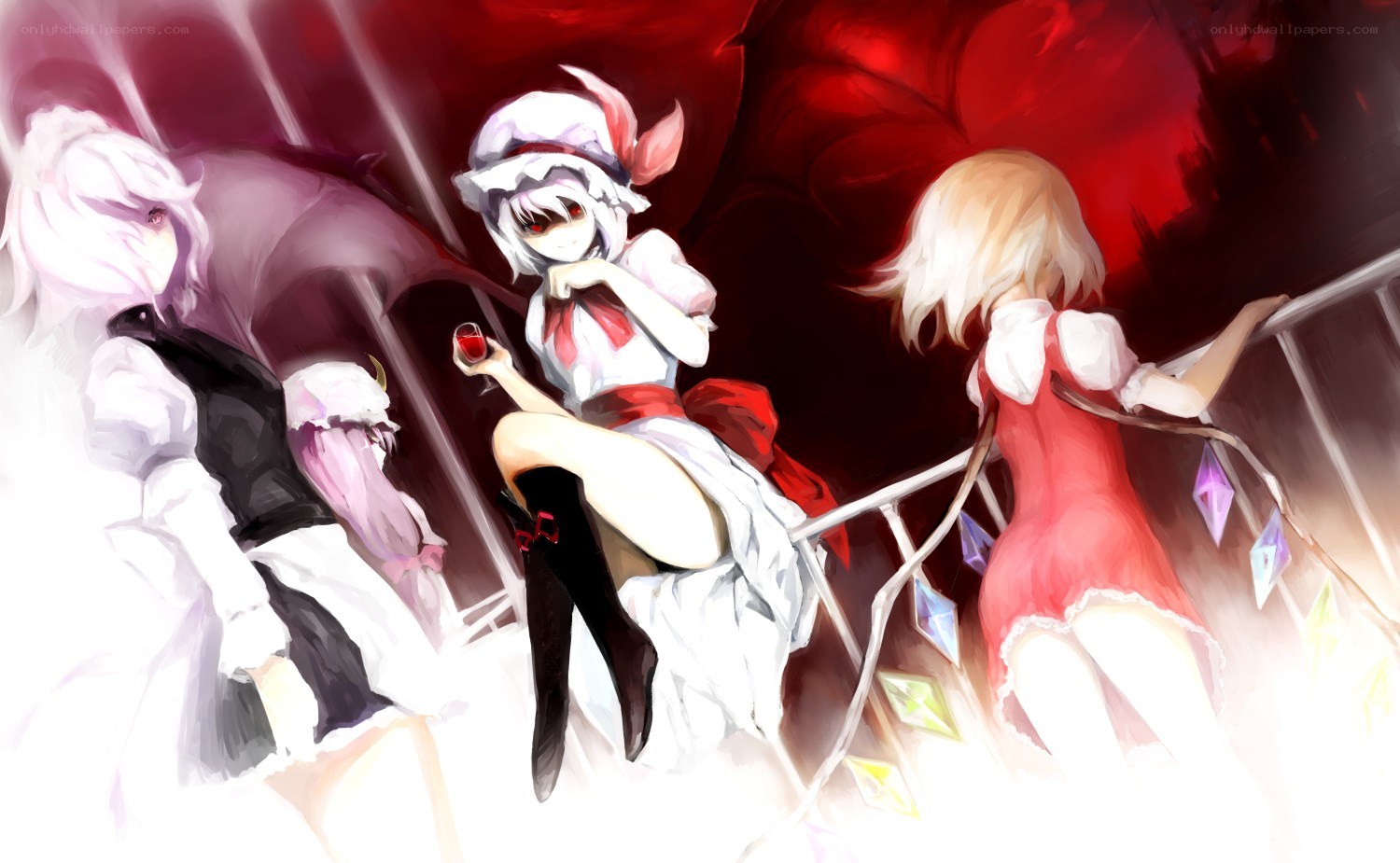 Three girls in a dark setting