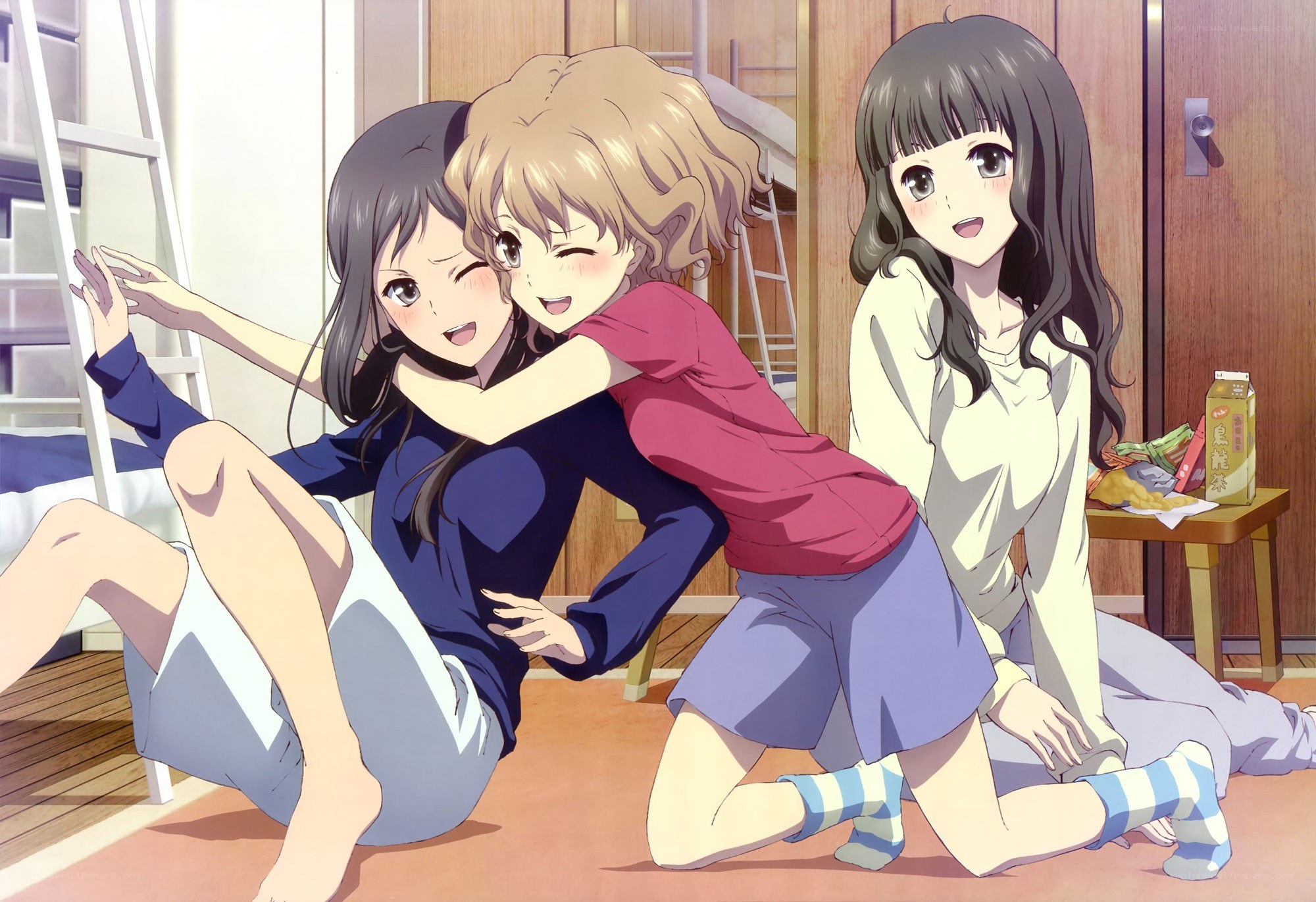 Three girls in a dorm room