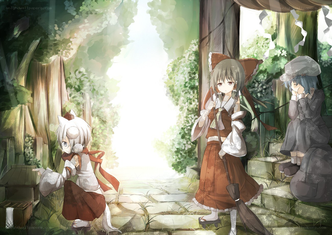 Three girls in a forest clearing