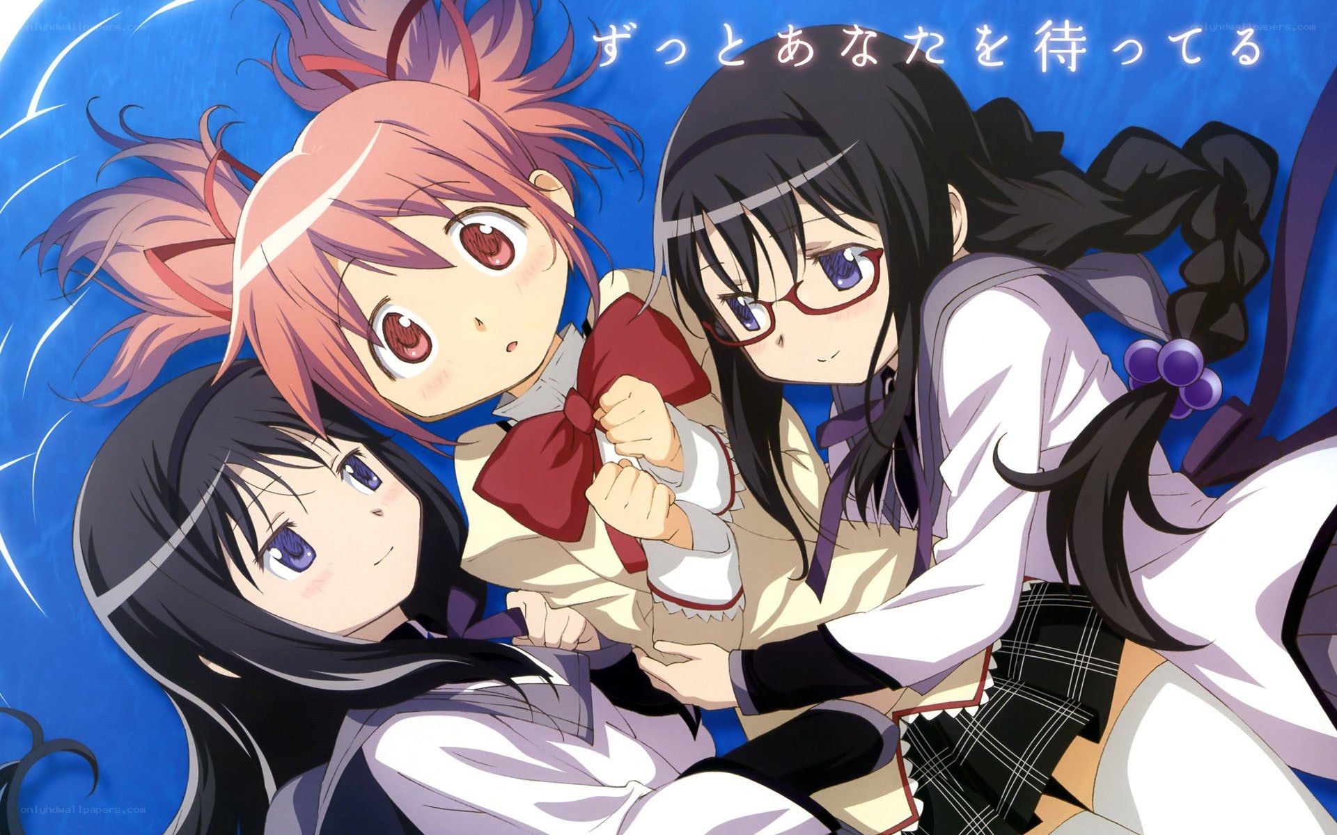 Three girls in a group hug