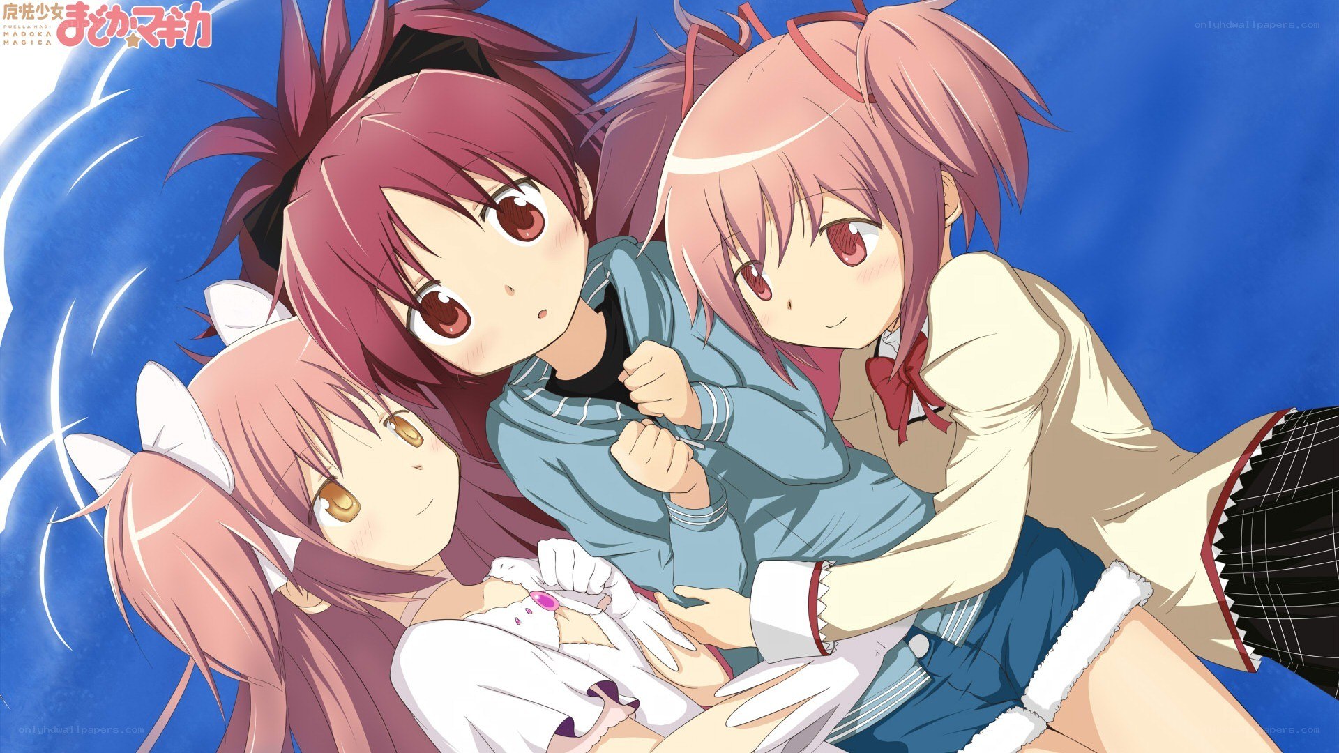 Three girls in a group hug