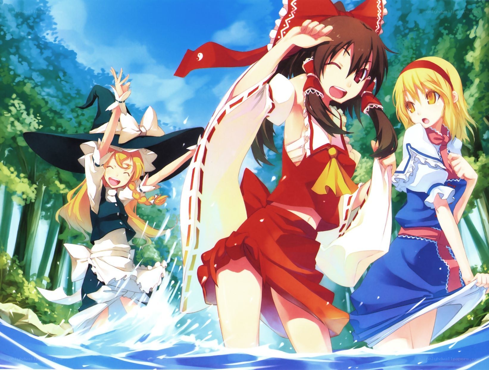 Three girls in a river