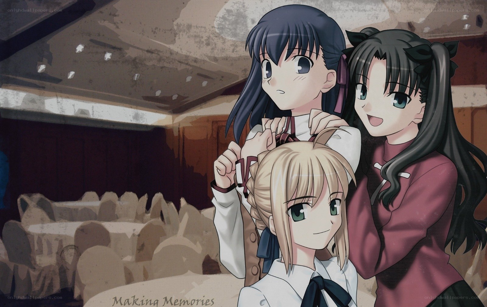 Three girls in a school hall