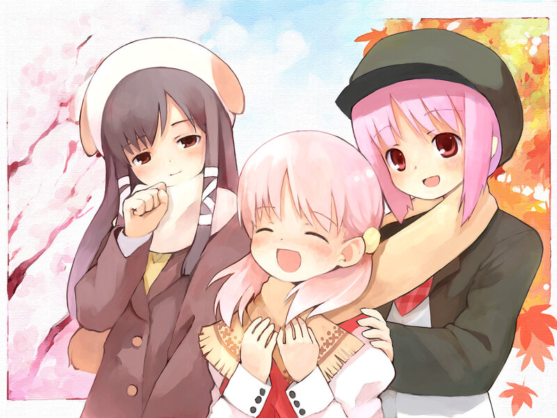 Three girls in a warm embrace