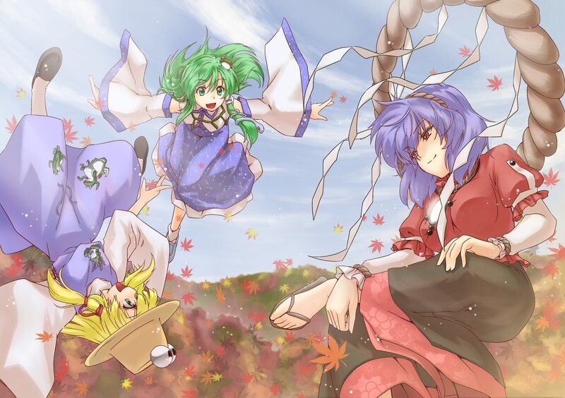 Three girls in autumn foliage