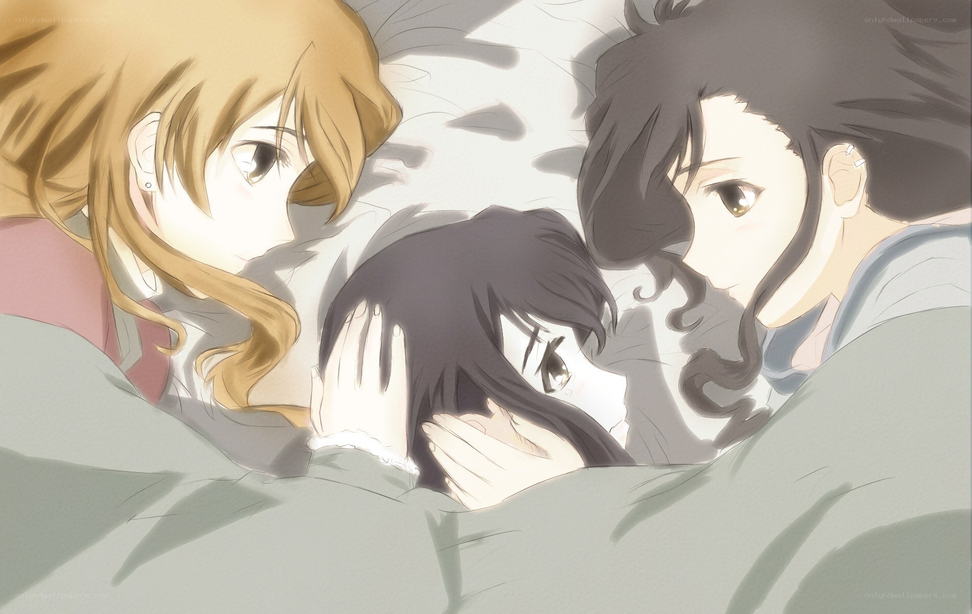 three girls in bed together