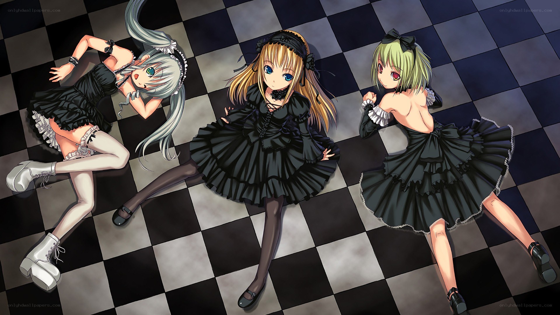 Three girls in black dresses