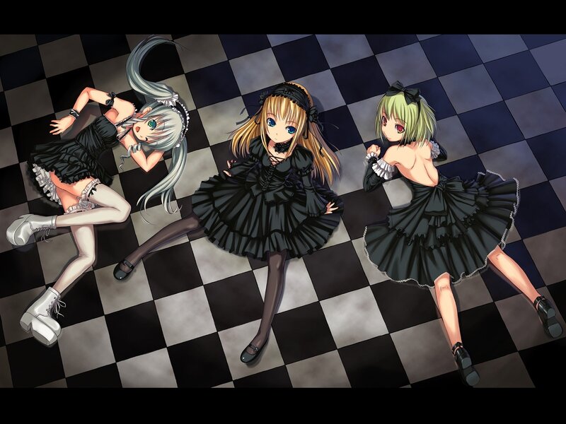 Three girls in black dresses on checkered floor