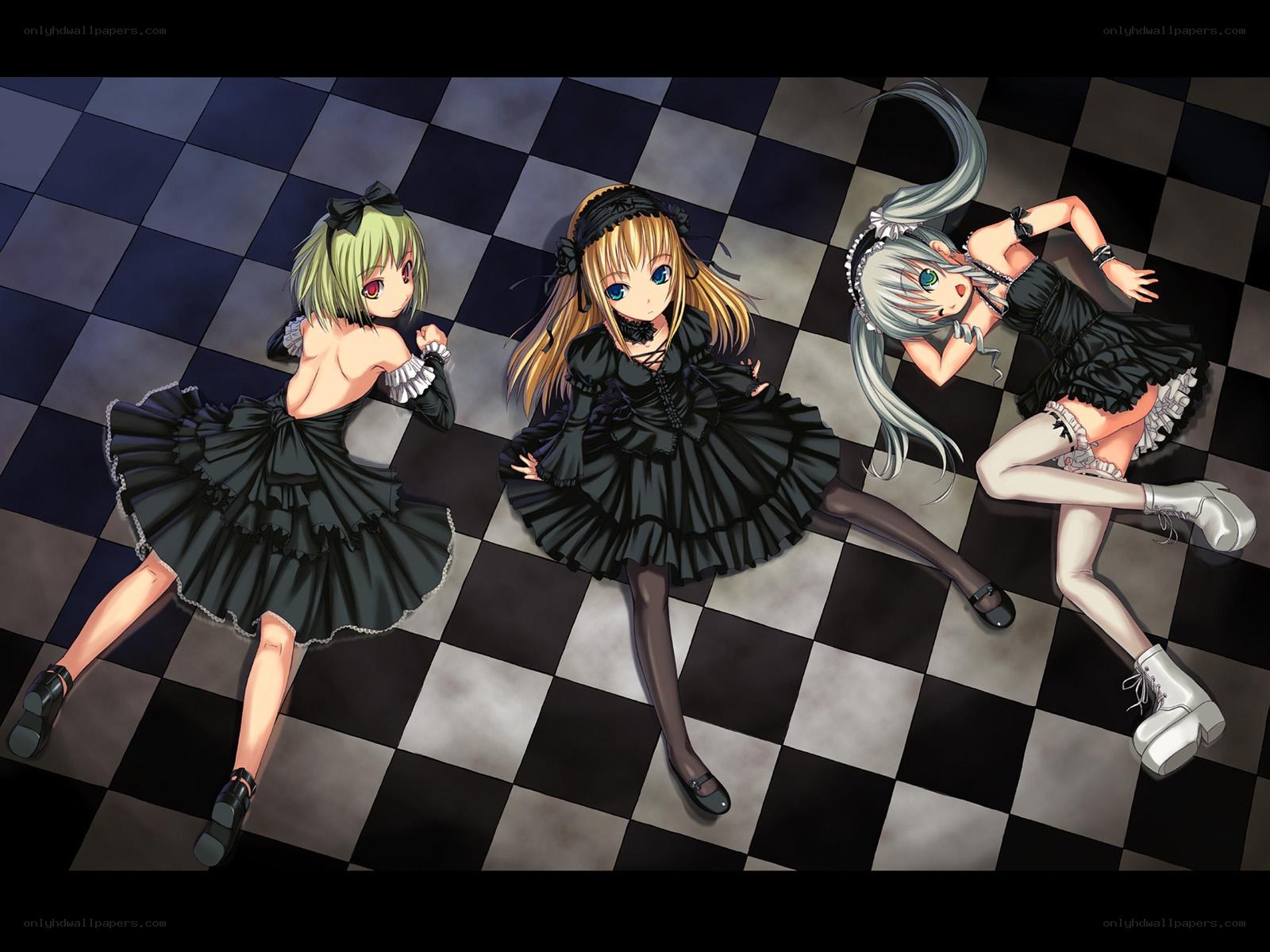 Three girls in black dresses