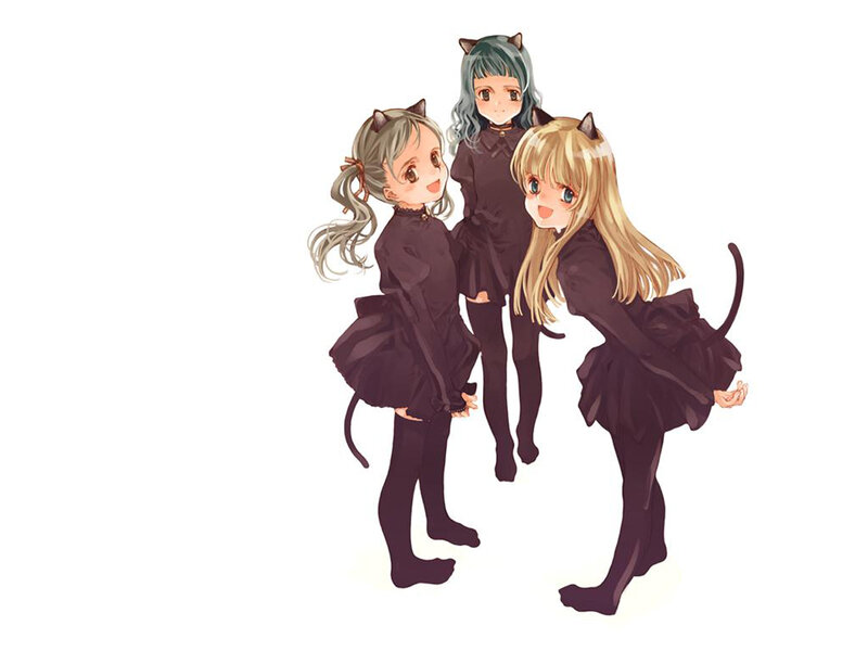 three girls in cat costumes