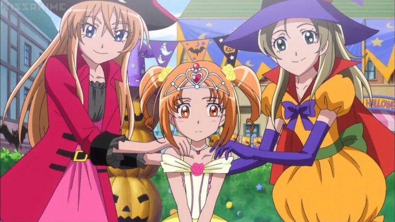 Three Girls in Costumes — Orange, Festive