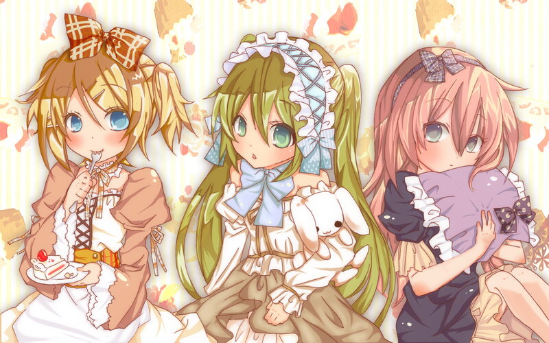Three girls in frilly dresses