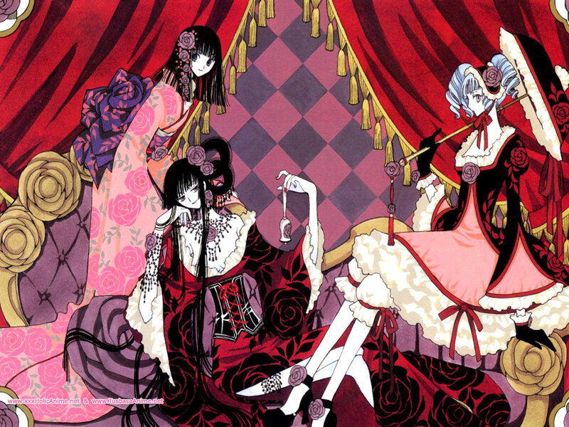 three girls in gothic dresses