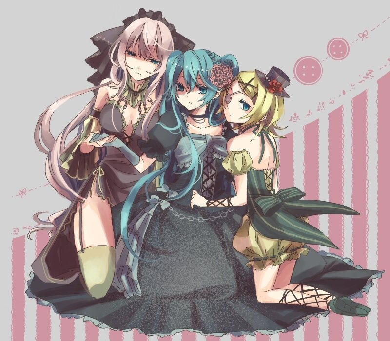 three girls in gothic dresses