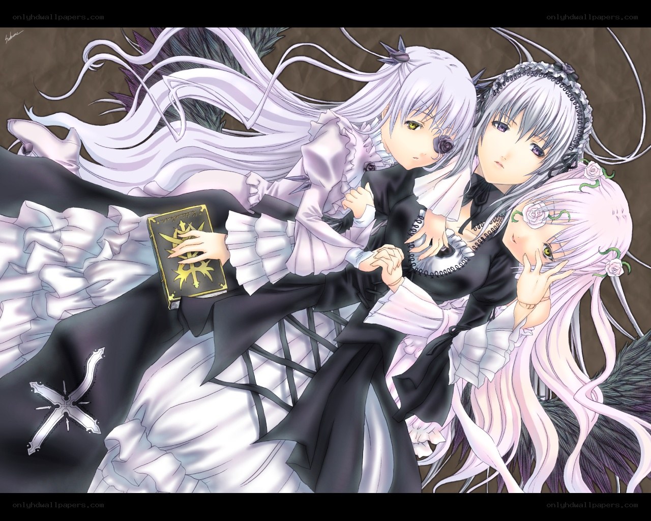 three girls in gothic dresses