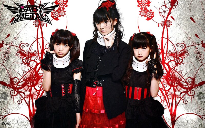Three Girls in Gothic Outfits