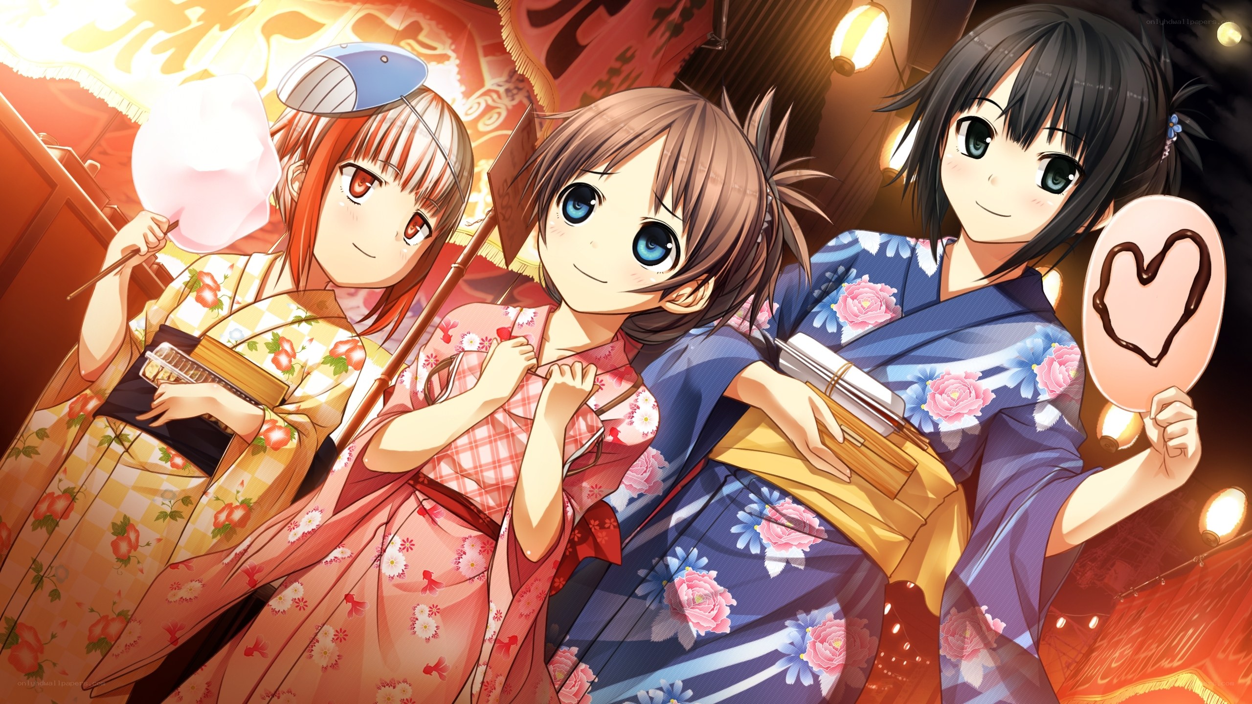 Three girls in kimonos at festival