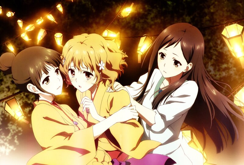 Three girls in kimonos at night