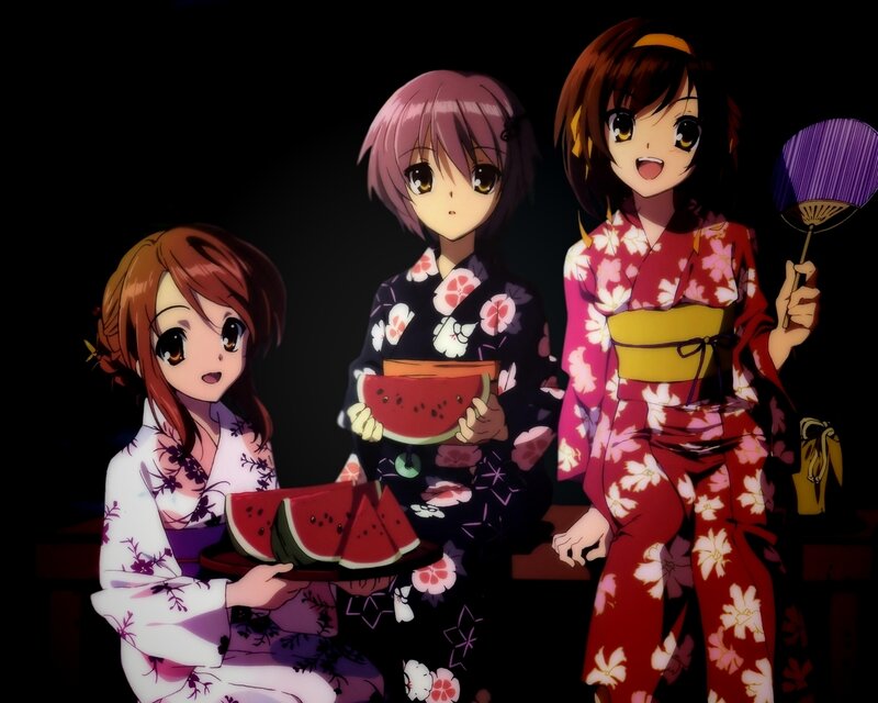 Three girls in kimonos with watermelon
