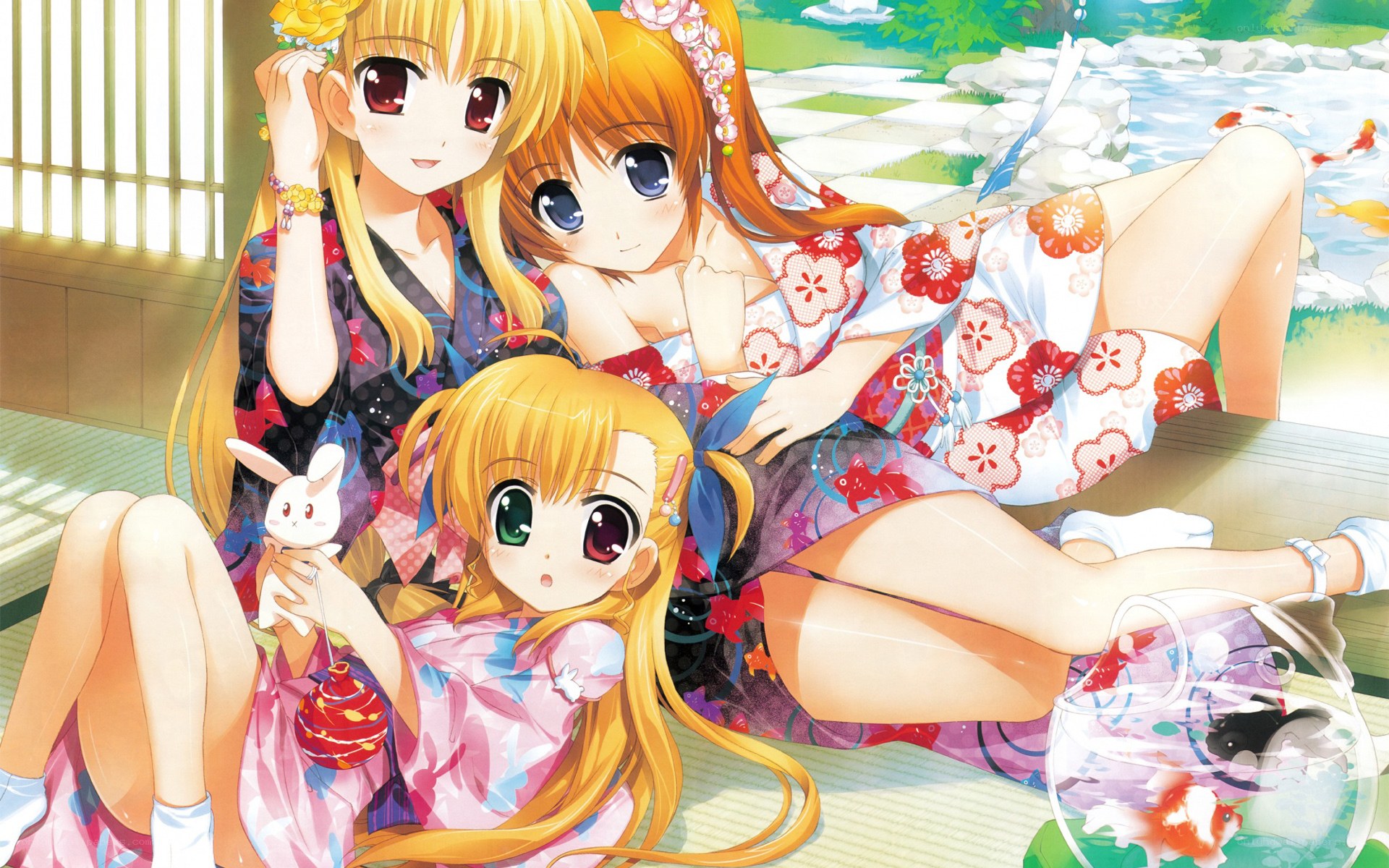 Three girls in kimonos