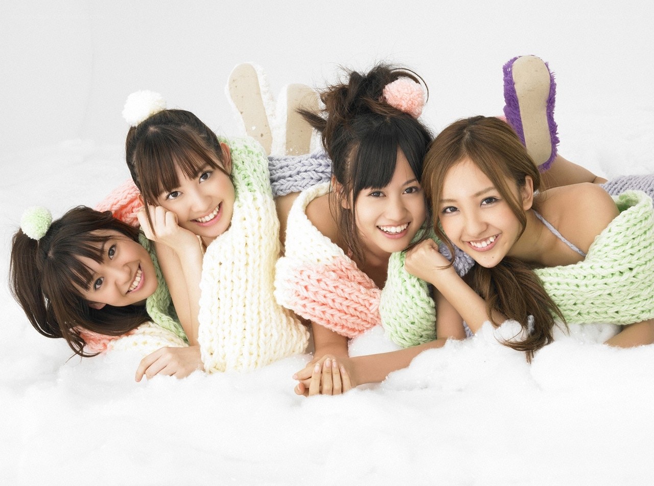 three girls in knitwear