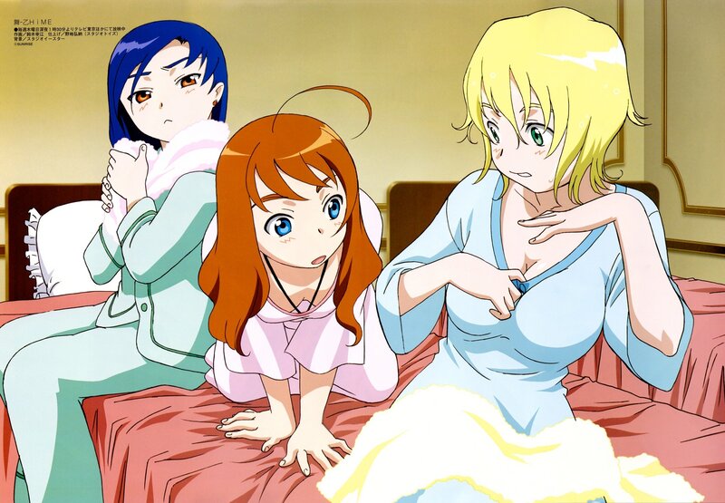 Three girls in pajamas on a bed