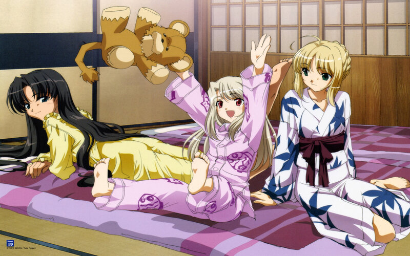 Three girls in pajamas on a bed