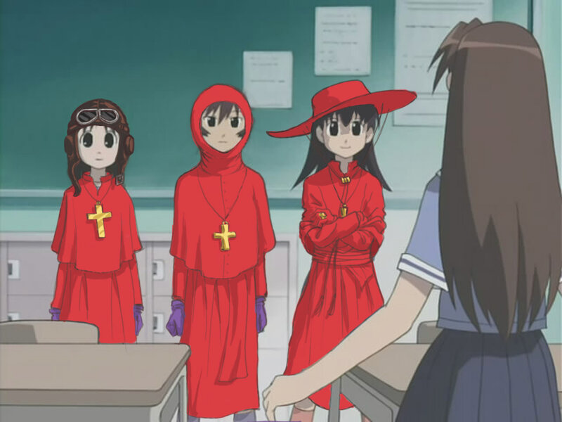 three girls in red robes
