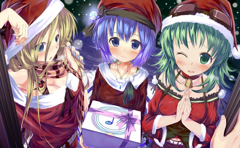 Three girls in Santa outfits