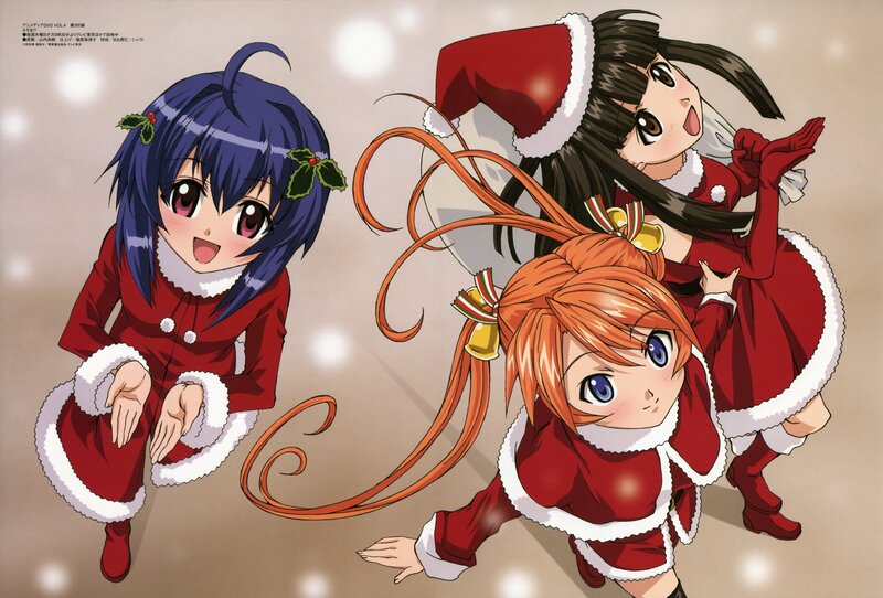 Three girls in Santa outfits