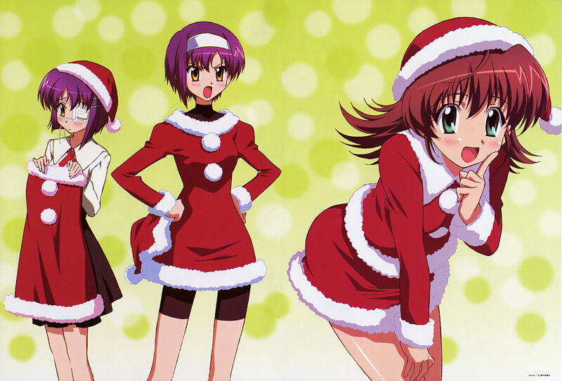 Three girls in Santa outfits
