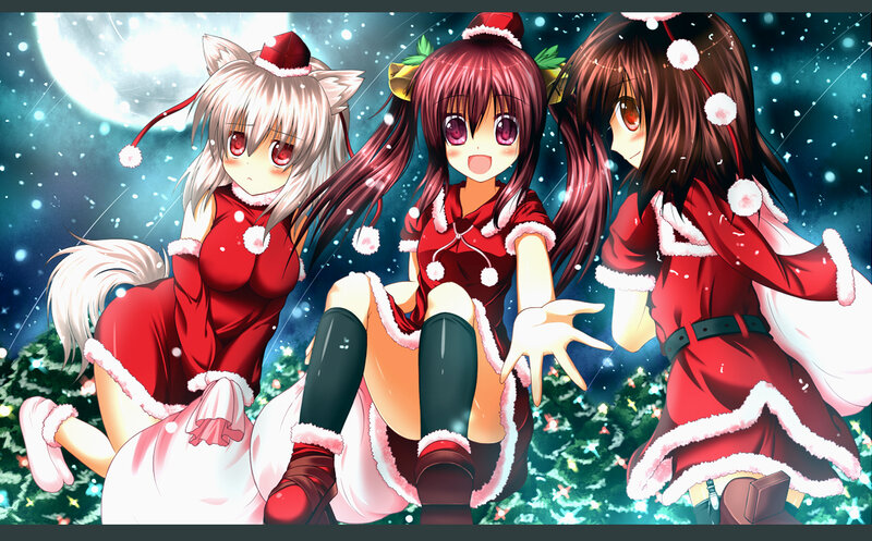 Three girls in Santa outfits