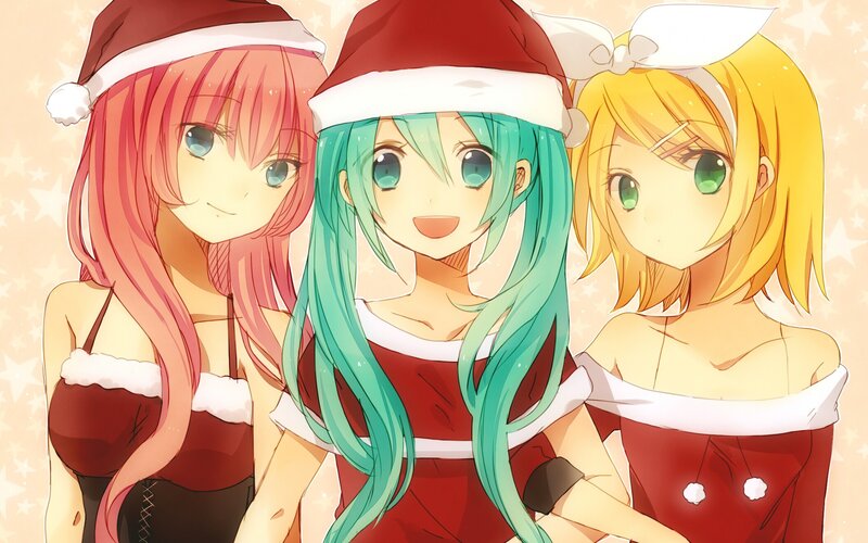 Three girls in Santa outfits