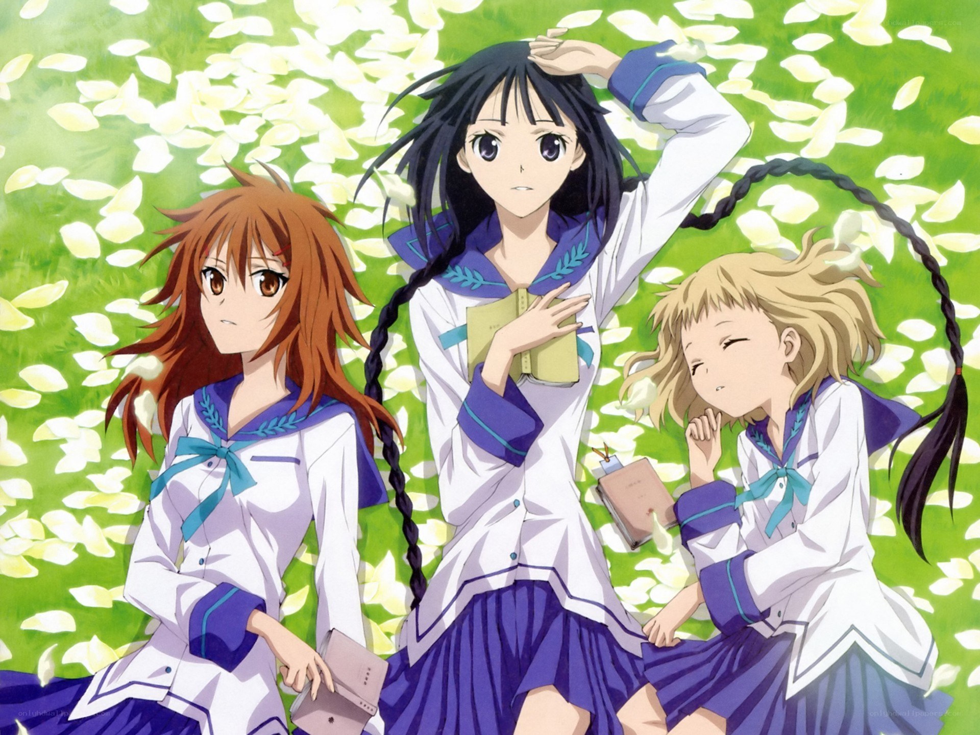 Three girls in school uniforms