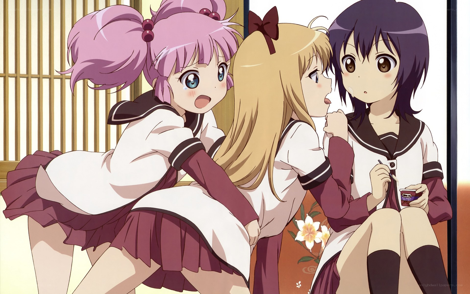Three girls in school uniforms