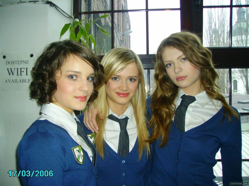 three girls in school uniforms