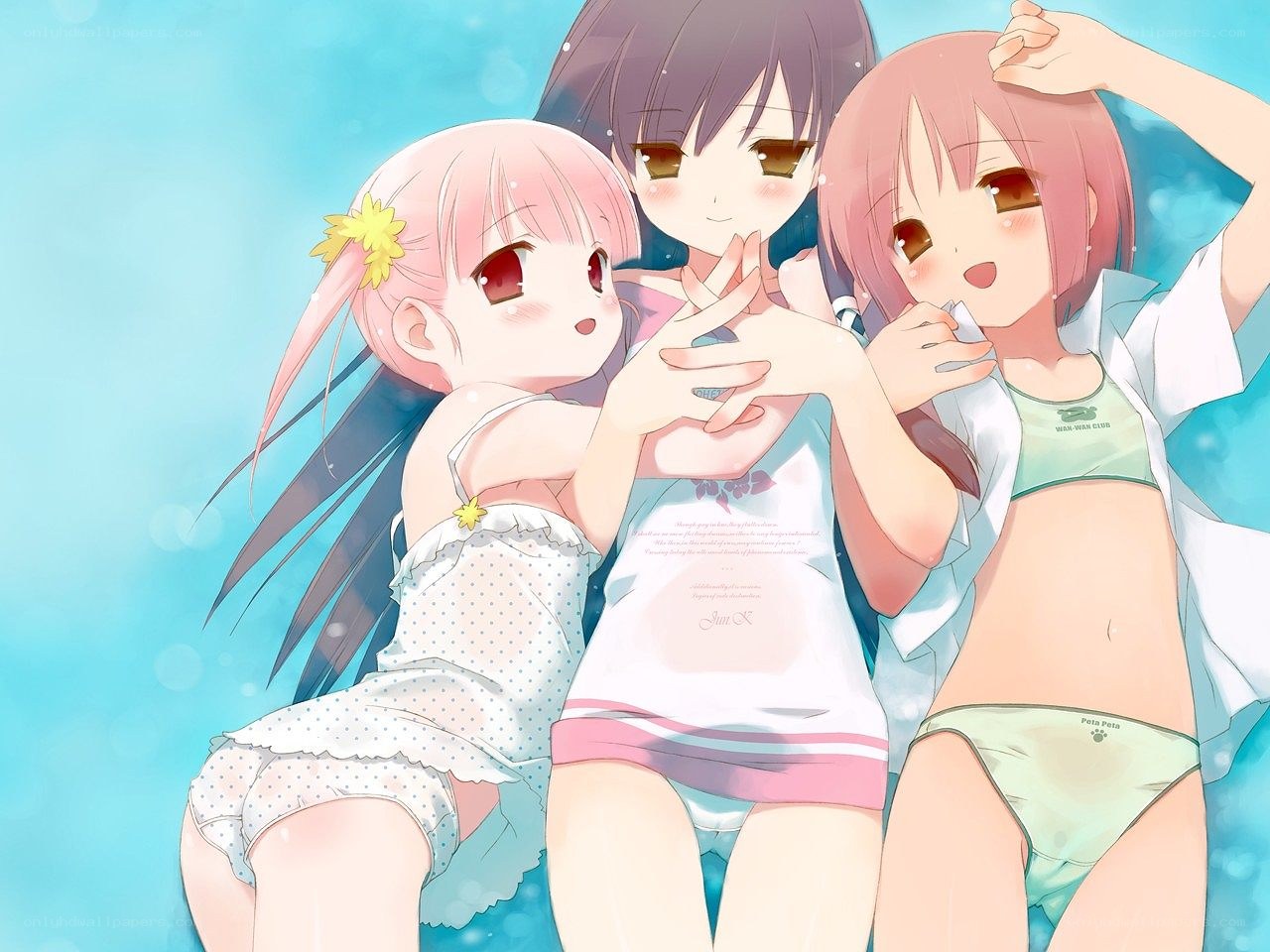 Three girls in swimsuits