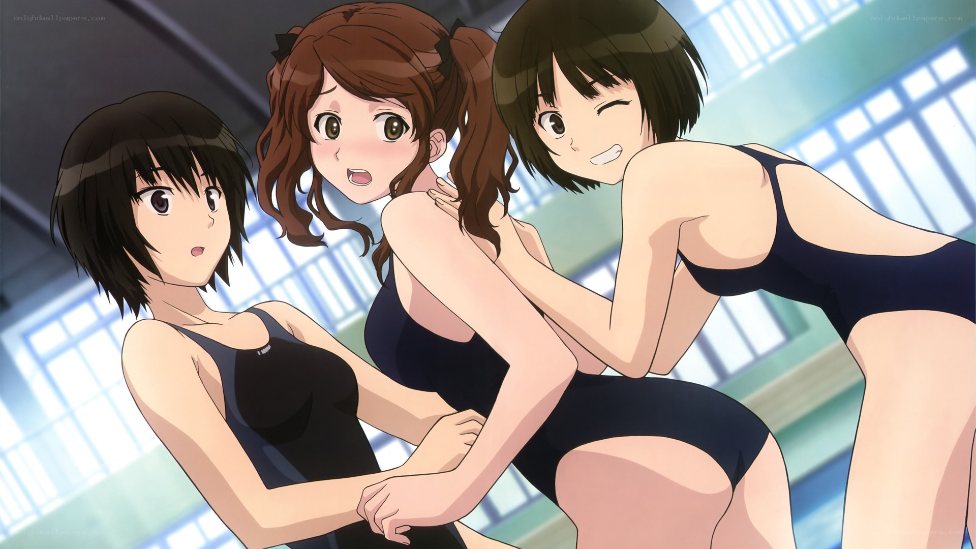 three girls in swimsuits