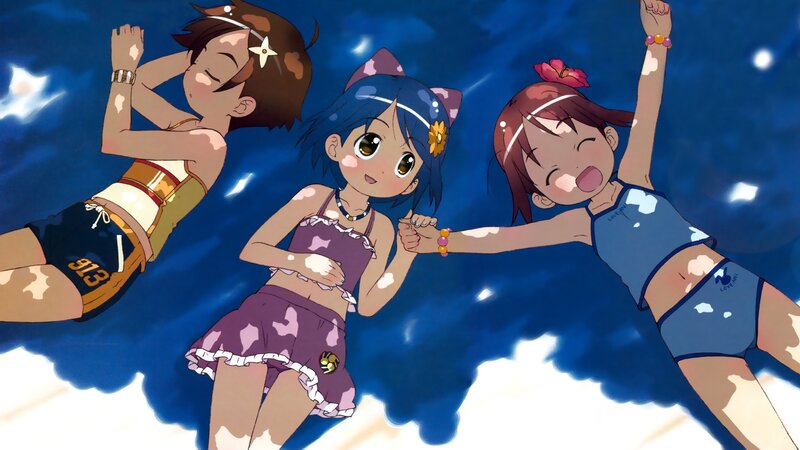 Three girls in swimsuits