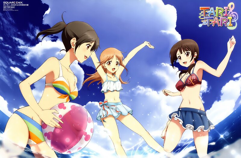 Three girls in swimsuits at the beach