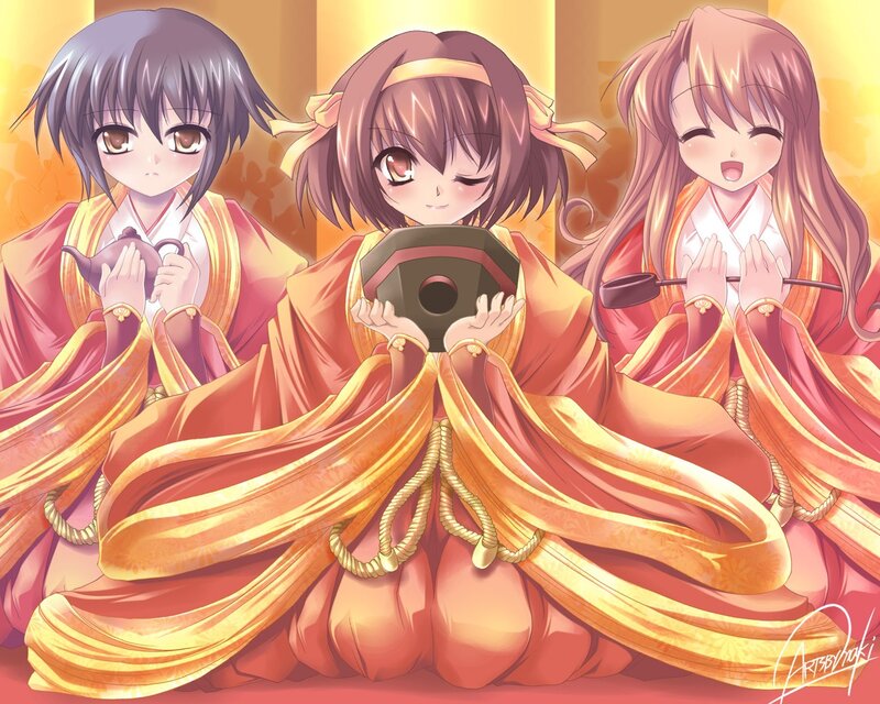 Three girls in traditional robes