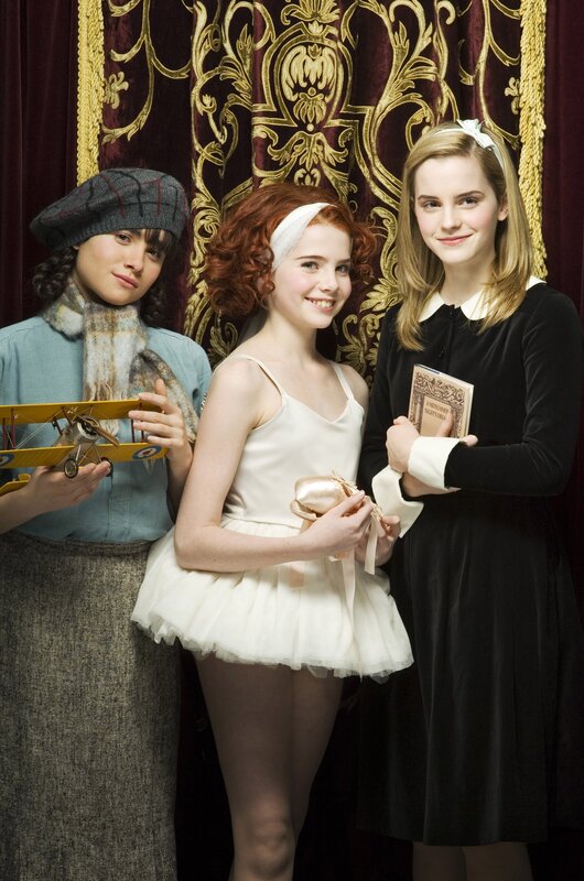 Three girls in vintage costumes