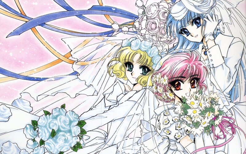 three girls in wedding dresses