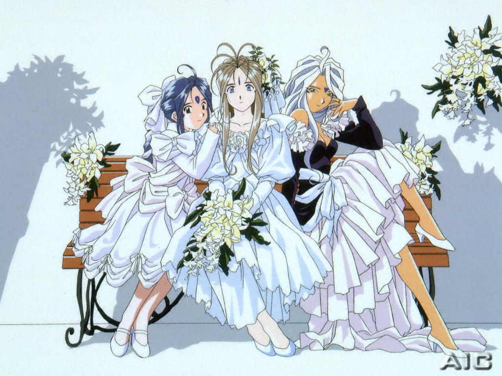 Three girls in wedding dresses