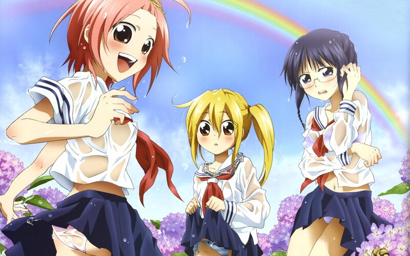 Three girls in wet school uniforms