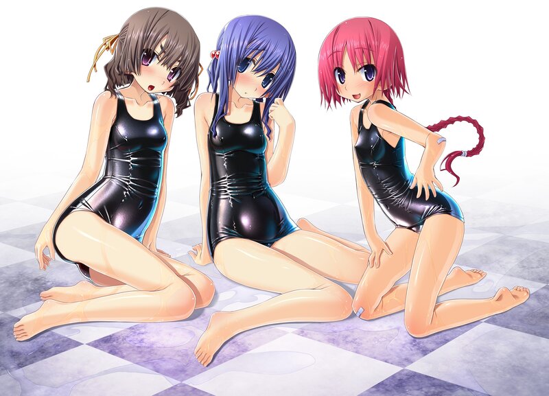 Three girls in wet swimsuits